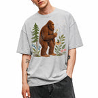 SF_COLOR=sport-grey; SF_ITEM=adult-t-shirt; SF_ROLE=gallery; Funny Bigfoot Blowing A Dandelion T-Shirt Retro Floral Sasquatch Outdoors Tee - Sport Grey Adult T-Shirt product image