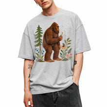 SF_COLOR=sport-grey; SF_ITEM=adult-t-shirt; SF_ROLE=gallery; Funny Bigfoot Blowing A Dandelion T-Shirt Retro Floral Sasquatch Outdoors Tee - Sport Grey Adult T-Shirt product image