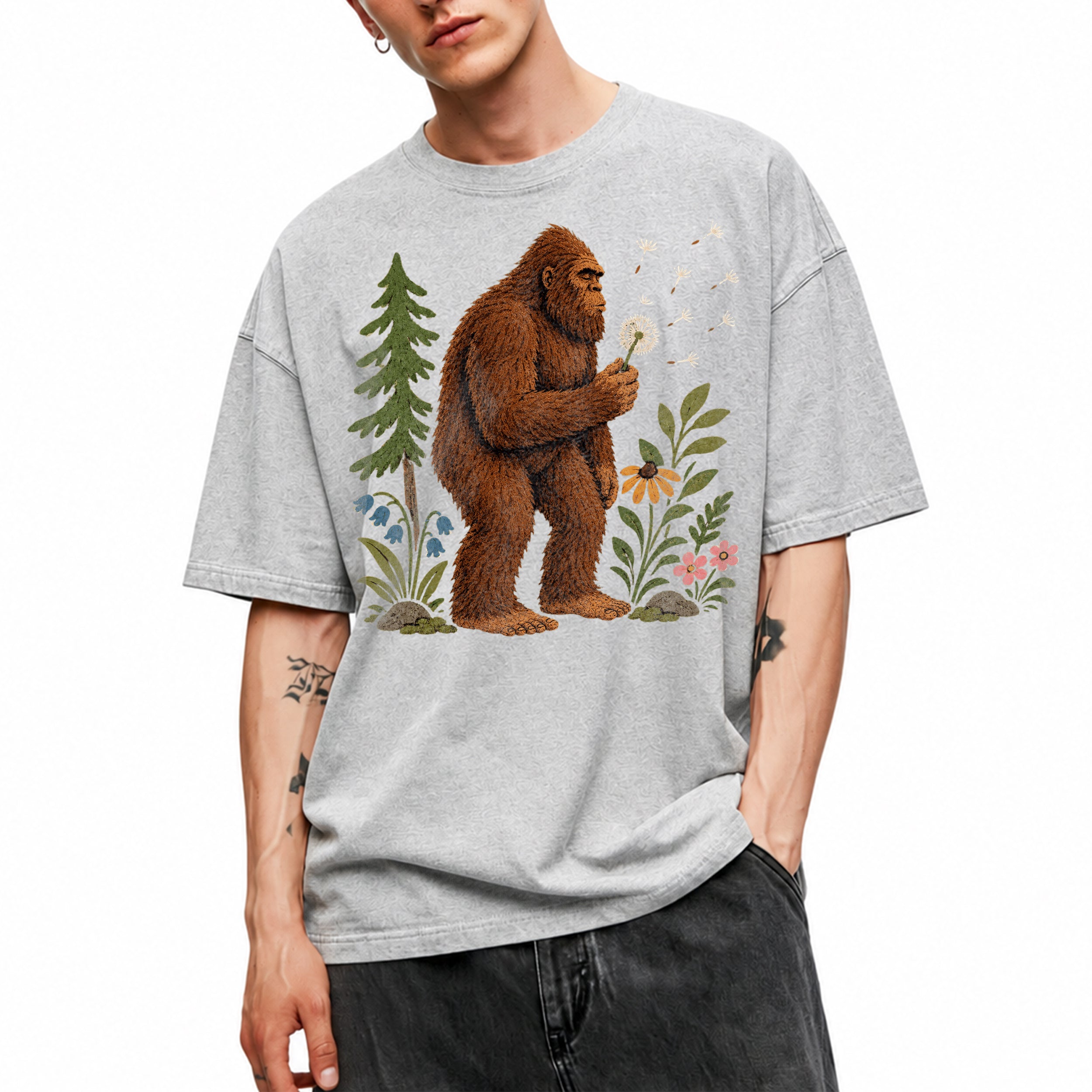 SF_COLOR=sport-grey; SF_ITEM=adult-t-shirt; SF_ROLE=gallery; Funny Bigfoot Blowing A Dandelion T-Shirt Retro Floral Sasquatch Outdoors Tee - Sport Grey Adult T-Shirt product image