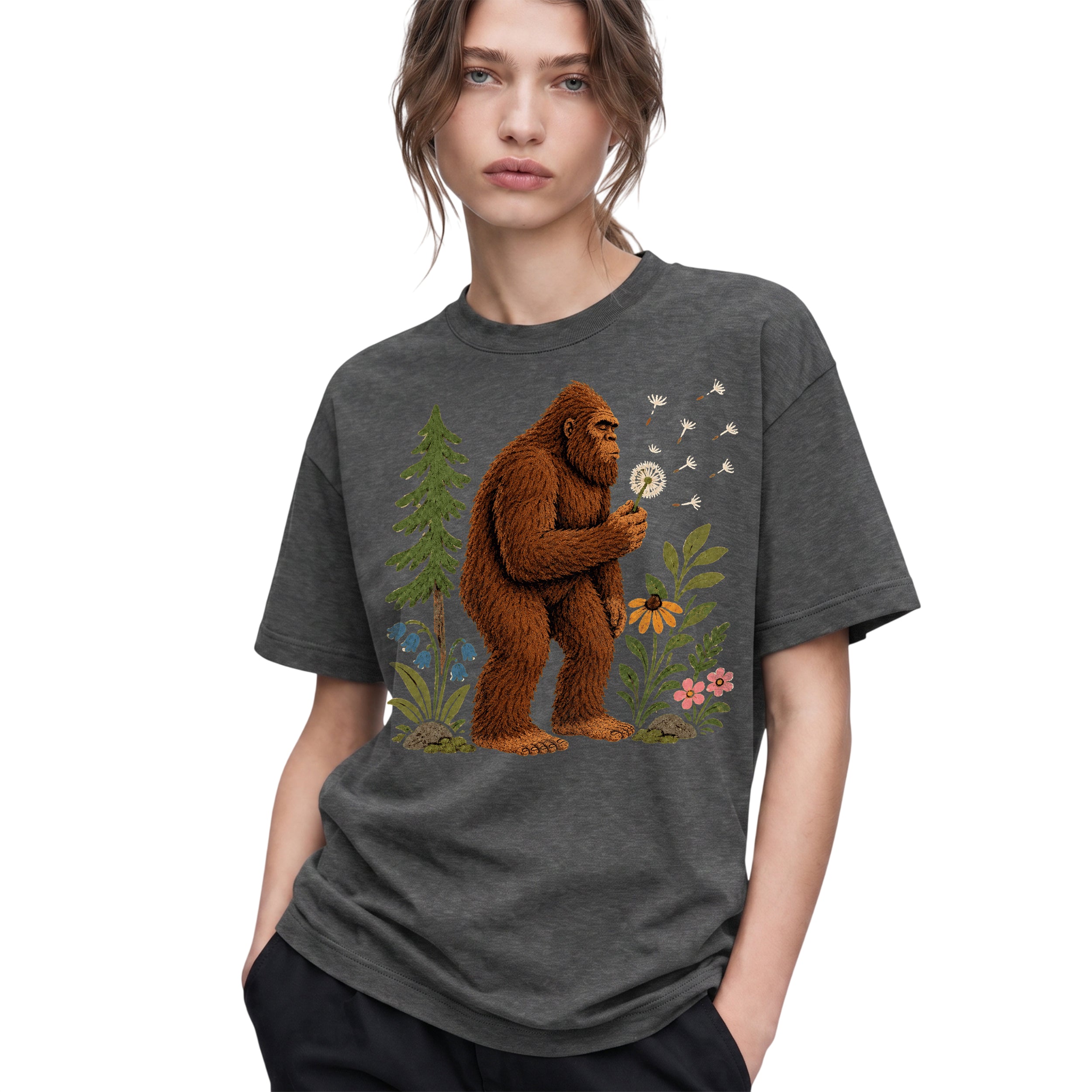 SF_COLOR=dark-heather; SF_ITEM=adult-t-shirt; SF_ROLE=gallery; Funny Bigfoot Blowing A Dandelion T-Shirt Retro Floral Sasquatch Outdoors Tee - Dark Heather Adult T-Shirt product image