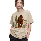 SF_COLOR=sand; SF_ITEM=adult-t-shirt; SF_ROLE=gallery; Funny Bigfoot Blowing A Dandelion T-Shirt Retro Floral Sasquatch Outdoors Tee - Sand Adult T-Shirt product image