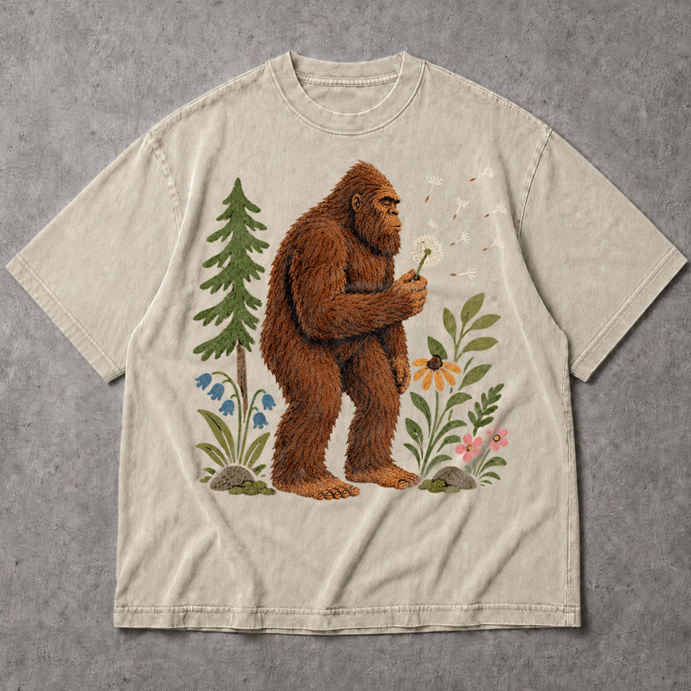 SF_COLOR=sand; SF_ITEM=adult-t-shirt; SF_ROLE=main; Funny Bigfoot Blowing A Dandelion T-Shirt Retro Floral Sasquatch Outdoors Tee - Sand Adult T-Shirt product image