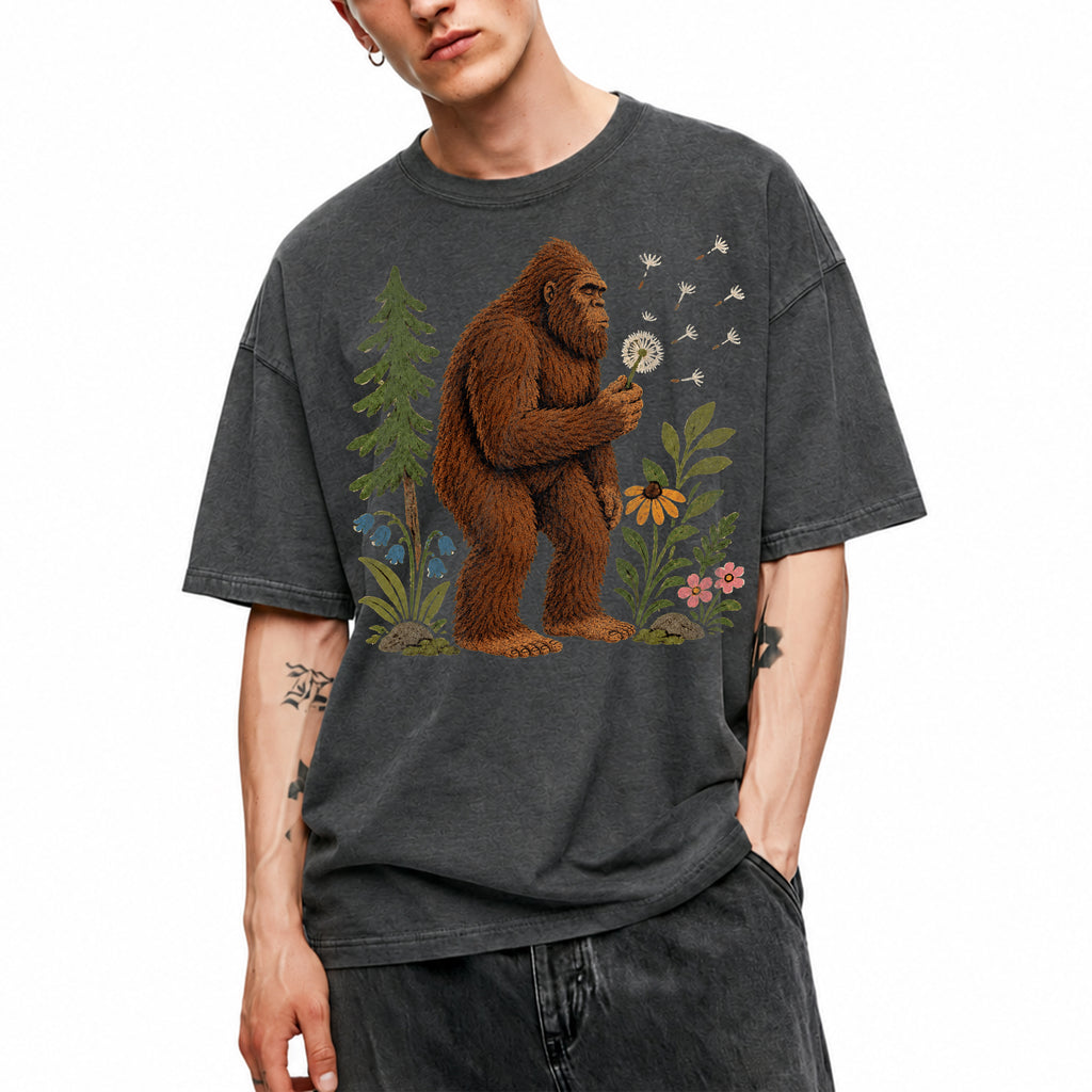 SF_COLOR=dark-heather; SF_ITEM=adult-t-shirt; SF_ROLE=gallery; Funny Bigfoot Blowing A Dandelion T-Shirt Retro Floral Sasquatch Outdoors Tee - Dark Heather Adult T-Shirt product image