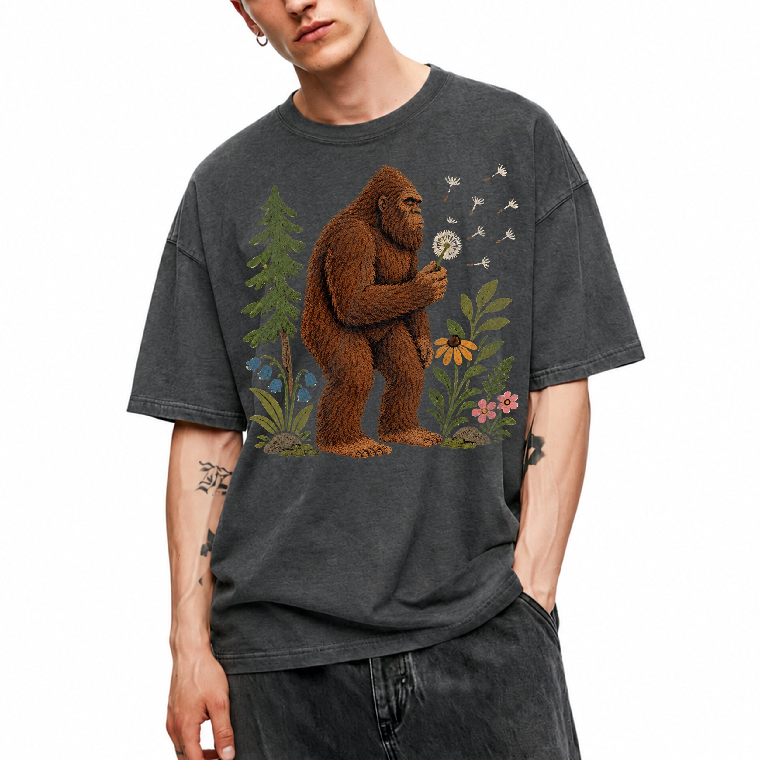 SF_COLOR=dark-heather; SF_ITEM=adult-t-shirt; SF_ROLE=gallery; Funny Bigfoot Blowing A Dandelion T-Shirt Retro Floral Sasquatch Outdoors Tee - Dark Heather Adult T-Shirt product image
