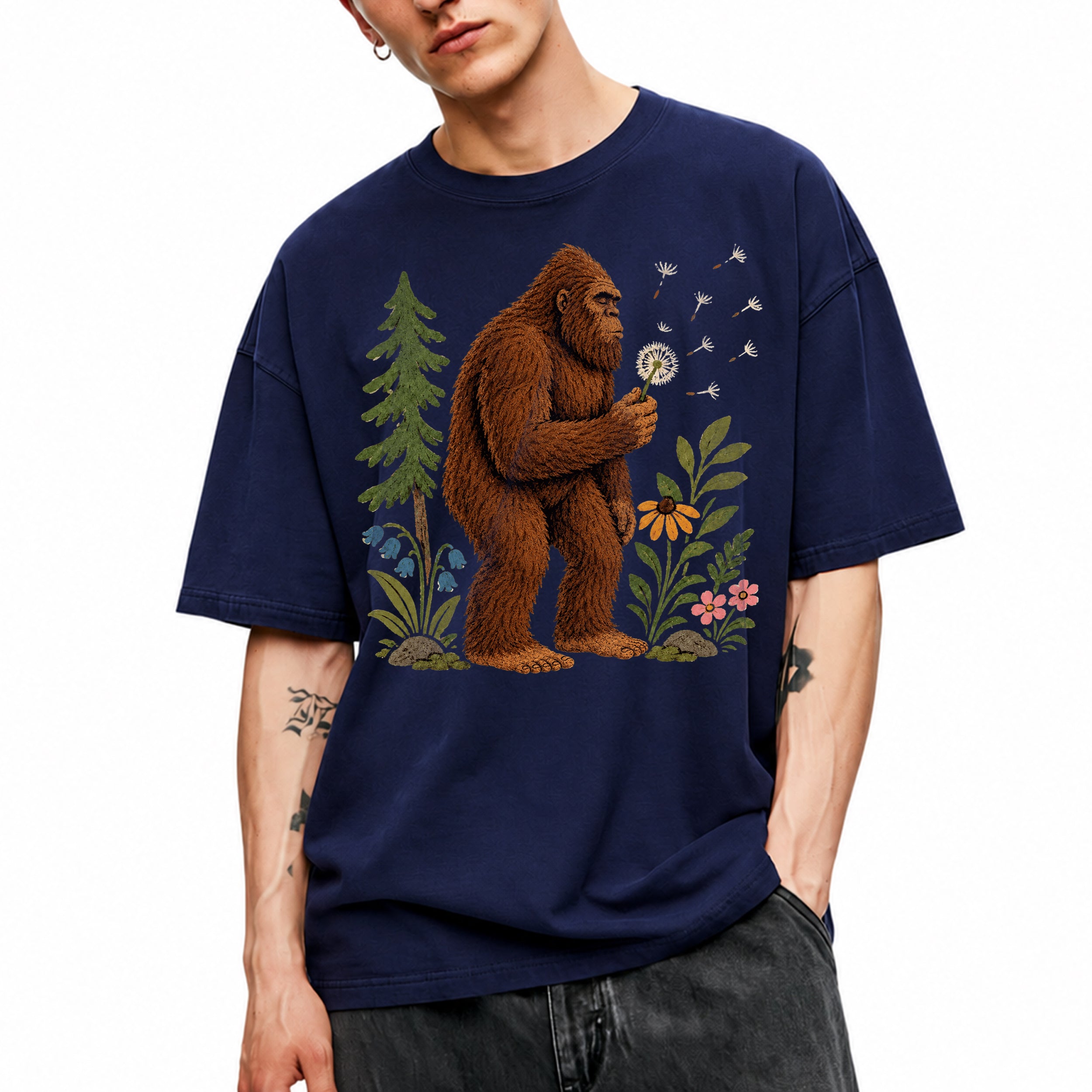 SF_COLOR=navy; SF_ITEM=adult-t-shirt; SF_ROLE=gallery; Funny Bigfoot Blowing A Dandelion T-Shirt Retro Floral Sasquatch Outdoors Tee - Navy Adult T-Shirt product image