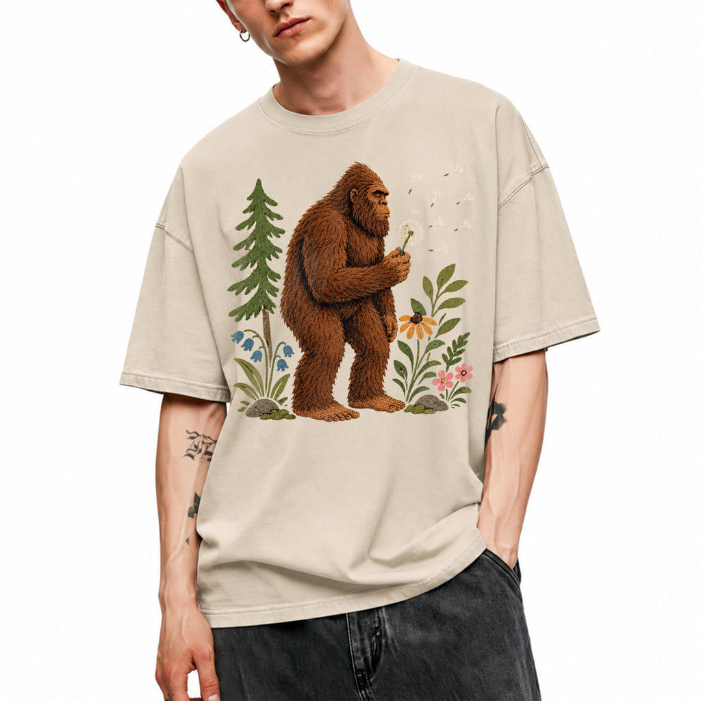 SF_COLOR=sand; SF_ITEM=adult-t-shirt; SF_ROLE=gallery; Funny Bigfoot Blowing A Dandelion T-Shirt Retro Floral Sasquatch Outdoors Tee - Sand Adult T-Shirt product image