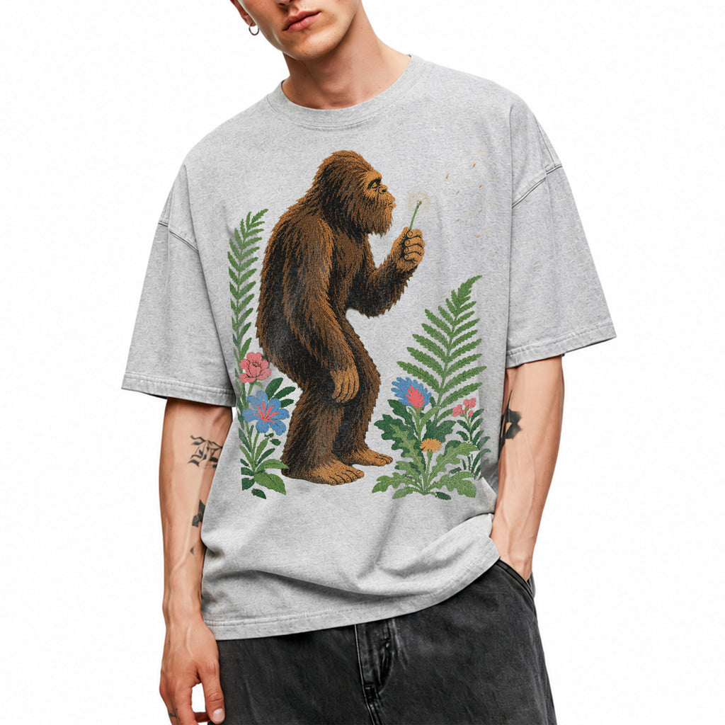 SF_COLOR=sport-grey; SF_ITEM=adult-t-shirt; SF_ROLE=gallery; Retro Bigfoot Blowing A Dandelion T-Shirt Vintage Sasquatch Floral Nature Tee - Sport Grey Adult T-Shirt product image