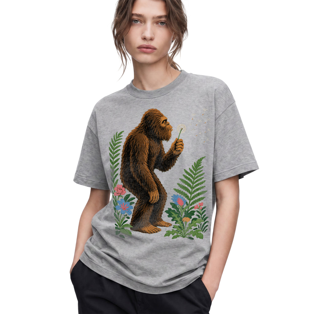 SF_COLOR=sport-grey; SF_ITEM=adult-t-shirt; SF_ROLE=gallery; Retro Bigfoot Blowing A Dandelion T-Shirt Vintage Sasquatch Floral Nature Tee - Sport Grey Adult T-Shirt product image