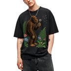 SF_COLOR=black; SF_ITEM=adult-t-shirt; SF_ROLE=gallery; Retro Bigfoot Blowing A Dandelion T-Shirt Vintage Sasquatch Floral Nature Tee - Black Adult T-Shirt product image