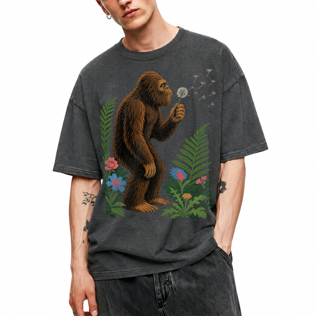 SF_COLOR=dark-heather; SF_ITEM=adult-t-shirt; SF_ROLE=gallery; Retro Bigfoot Blowing A Dandelion T-Shirt Vintage Sasquatch Floral Nature Tee - Dark Heather Adult T-Shirt product image