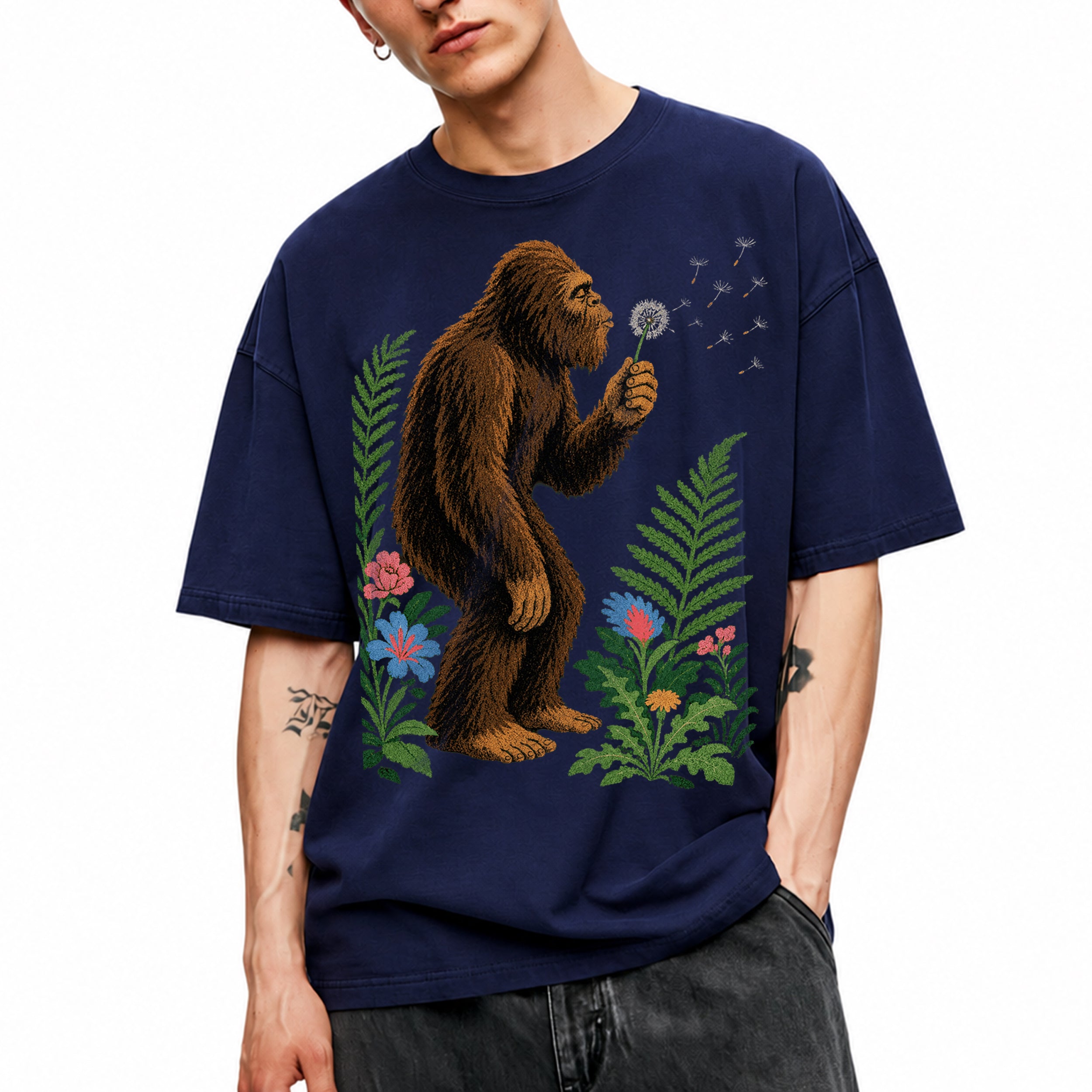 SF_COLOR=navy; SF_ITEM=adult-t-shirt; SF_ROLE=gallery; Retro Bigfoot Blowing A Dandelion T-Shirt Vintage Sasquatch Floral Nature Tee - Navy Adult T-Shirt product image