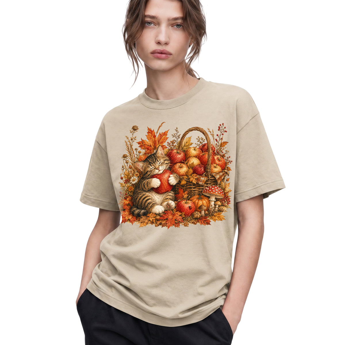 SF_COLOR=sand; SF_ITEM=adult-t-shirt; SF_ROLE=gallery; Tabby Kitten Hugging Red Apple Basket T-Shirt Cozy Autumn Cat Harvest Tee - Sand Adult T-Shirt product image