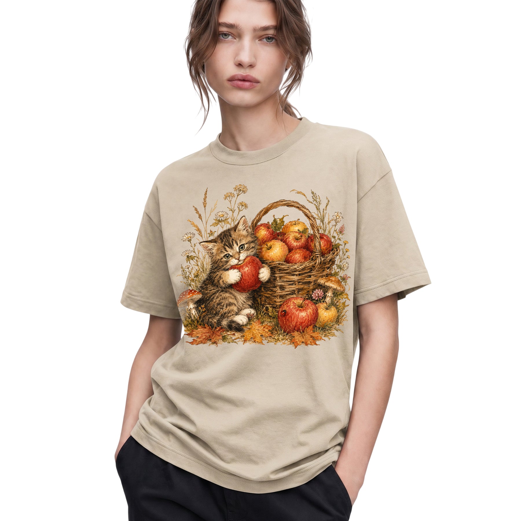 SF_COLOR=sand; SF_ITEM=adult-t-shirt; SF_ROLE=gallery; Tabby Kitten Holding Apple Autumn Basket T-Shirt Cute Fall Cat Harvest Tee - Sand Adult T-Shirt product image
